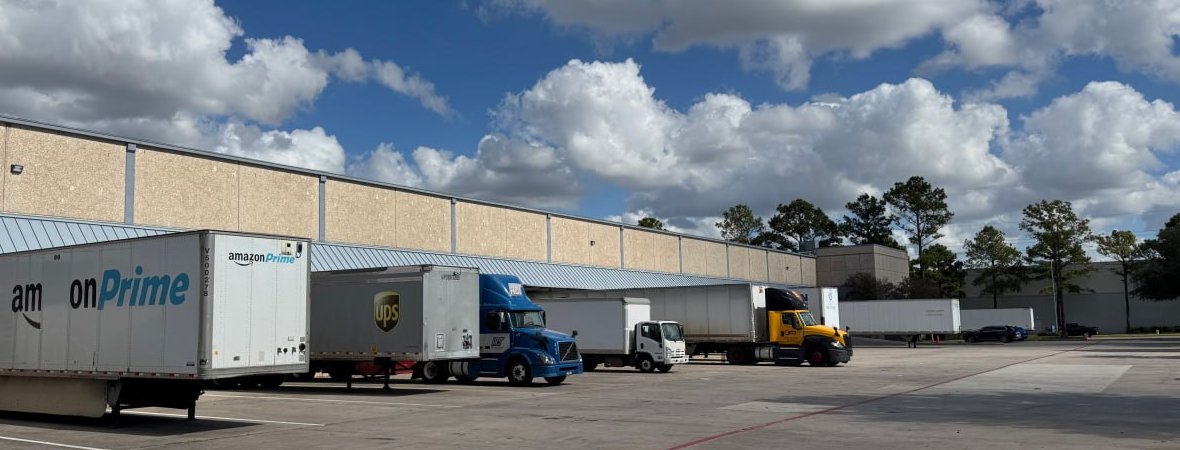 Thrive 3PL loading dock with Amazon, UPS, and freight trucks