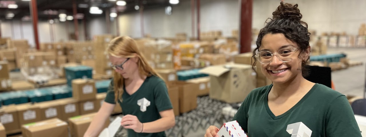 Thrive 3PL warehouse team packing orders